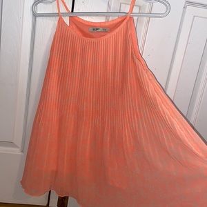 Orange pleated swing top